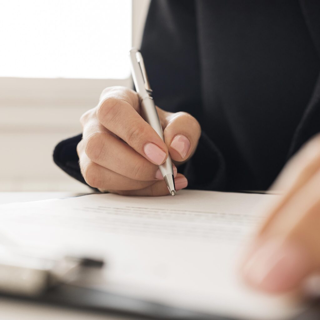 A person signing a document
