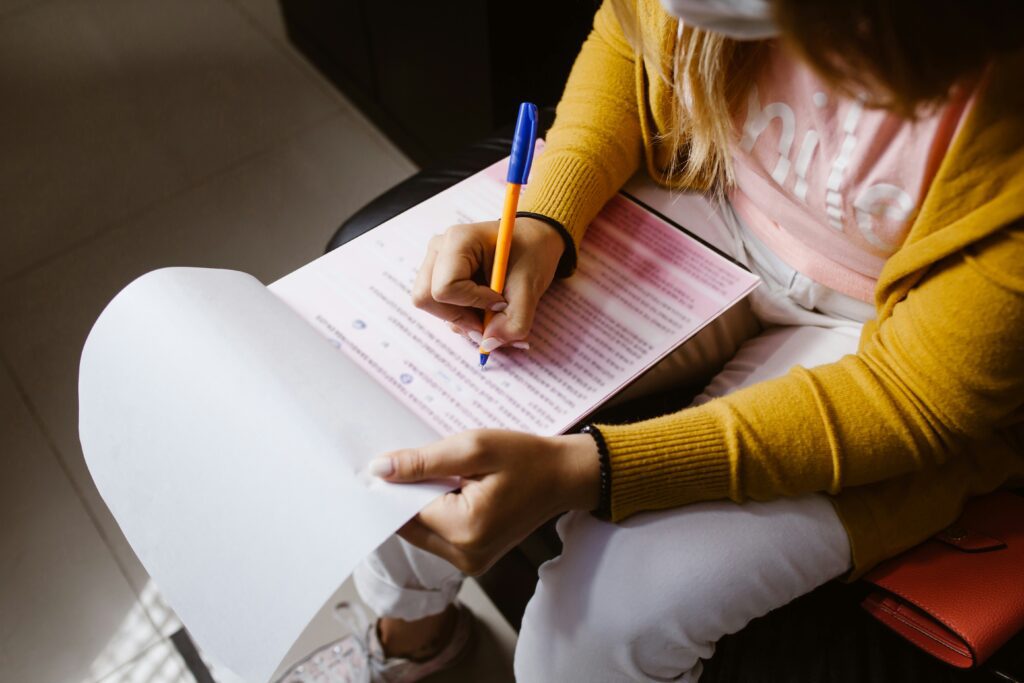 signing a document on clipboard from a mobile notary